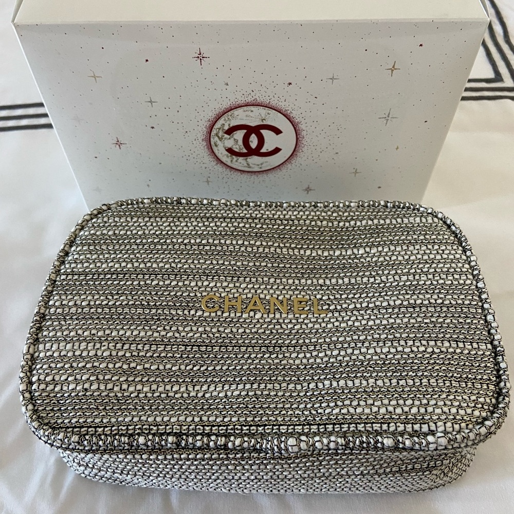 Chanel pouch in silver Color with Gold Hardware